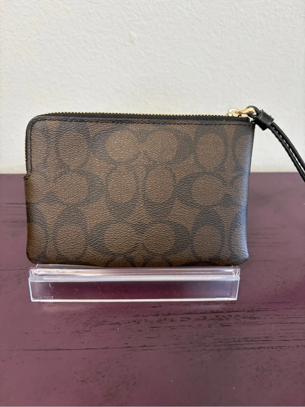 COACH Brown Signature Canvas Wristlet with Black Center Stripe and Gold Logo